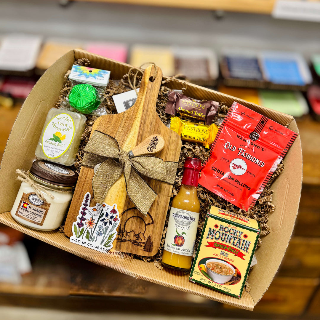 Colorado gift box including locally made food items, self care items, cutting board and treats all locally made here in Colorado. Great for corporate gifting, new homes, thank-you's and more. 