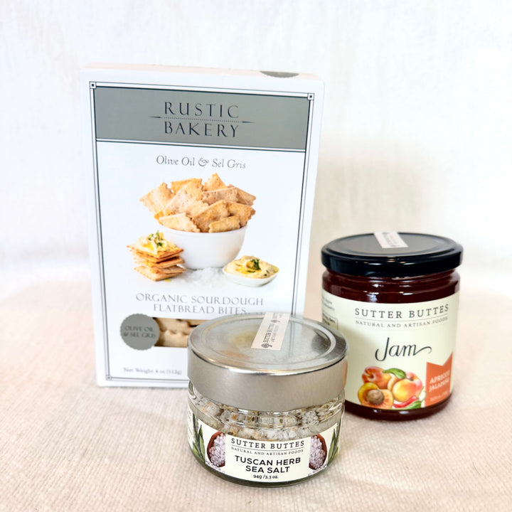 Elevate your next gathering with our Graze &amp; Gather Gift Set — a thoughtfully curated collection of savory favorites perfect for entertaining, gifting, or treating yourself. This delicious set includes crisp sourdough crackers, artisan jam, and handcrafted herb salts that bring gourmet flavor to every bite.