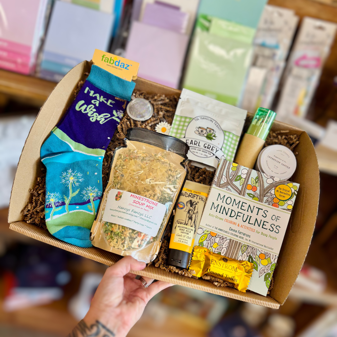 Give the gift of slowing down and savoring a little time for yourself. Filled with cozy, thoughtful touches, this box is perfect for anyone who could use a moment to relax, recharge and simply be.

Your Gift Box Might Include: Cozy Socks, Mindfulness Activity Book, Gourmet Soup Mix, Tea &amp; Infuser, Hand Lotion, Inspirational Candle, and a Sweet Chocolate Treat.

The perfect way to let someone know you are thinking about them.&nbsp;