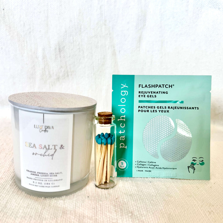 Our Rest Easy Gift Set is thoughtfully curated for moments of rest, relaxation, and everyday self-care. Featuring a locally hand-poured candle, coordinating matches, nourishing hand cream, and refreshing eye patches, this cozy collection is perfect for slowing down and creating a calming moment at home.