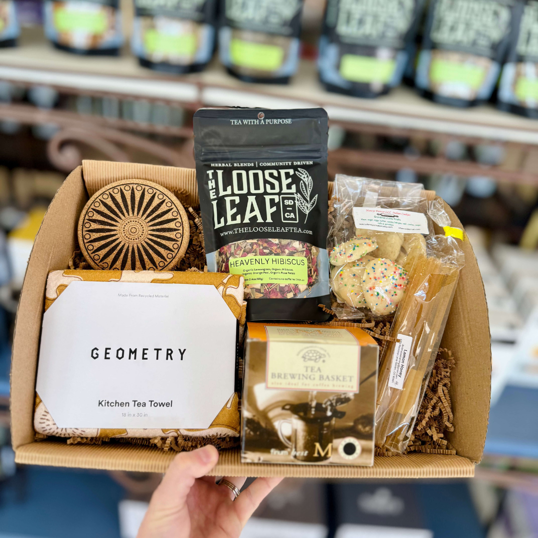 Gift box with cookies, tea, and kitchen towel for tea lover. Steeped in comfot tea lovers gift box