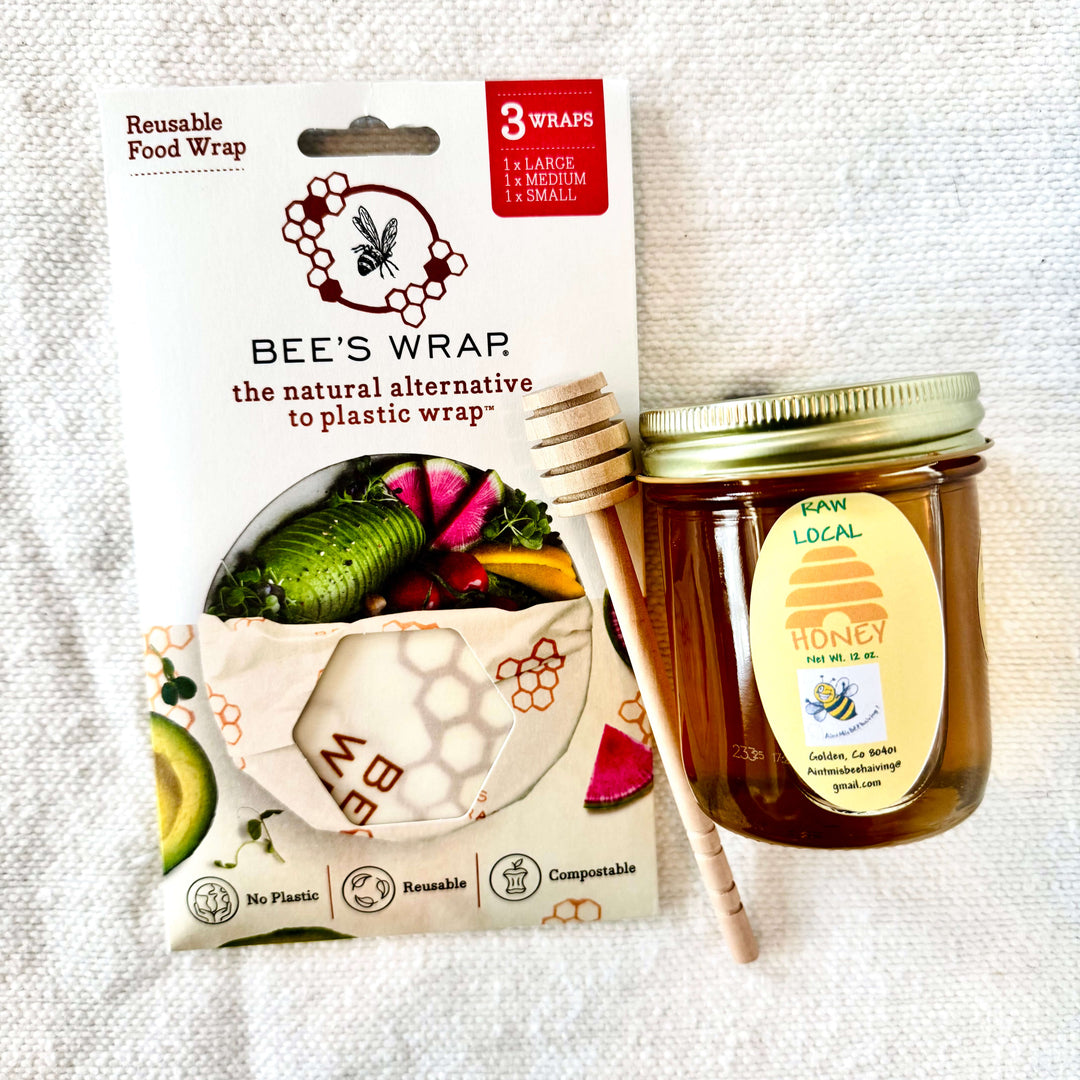 Treat someone special to a little sweetness with our Sweet as Honey Gift Set. Thoughtfully curated with locally made favorites, this cozy set includes a jar of local honey, a classic honey dipper, and a set of 3 reusable beeswax wraps—perfect for the kitchen, tea lovers, or anyone who appreciates simple everyday essentials.